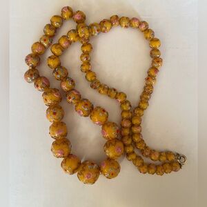 Vintage Italian Murano art glass necklace featuring a "wedding cake" design 24”